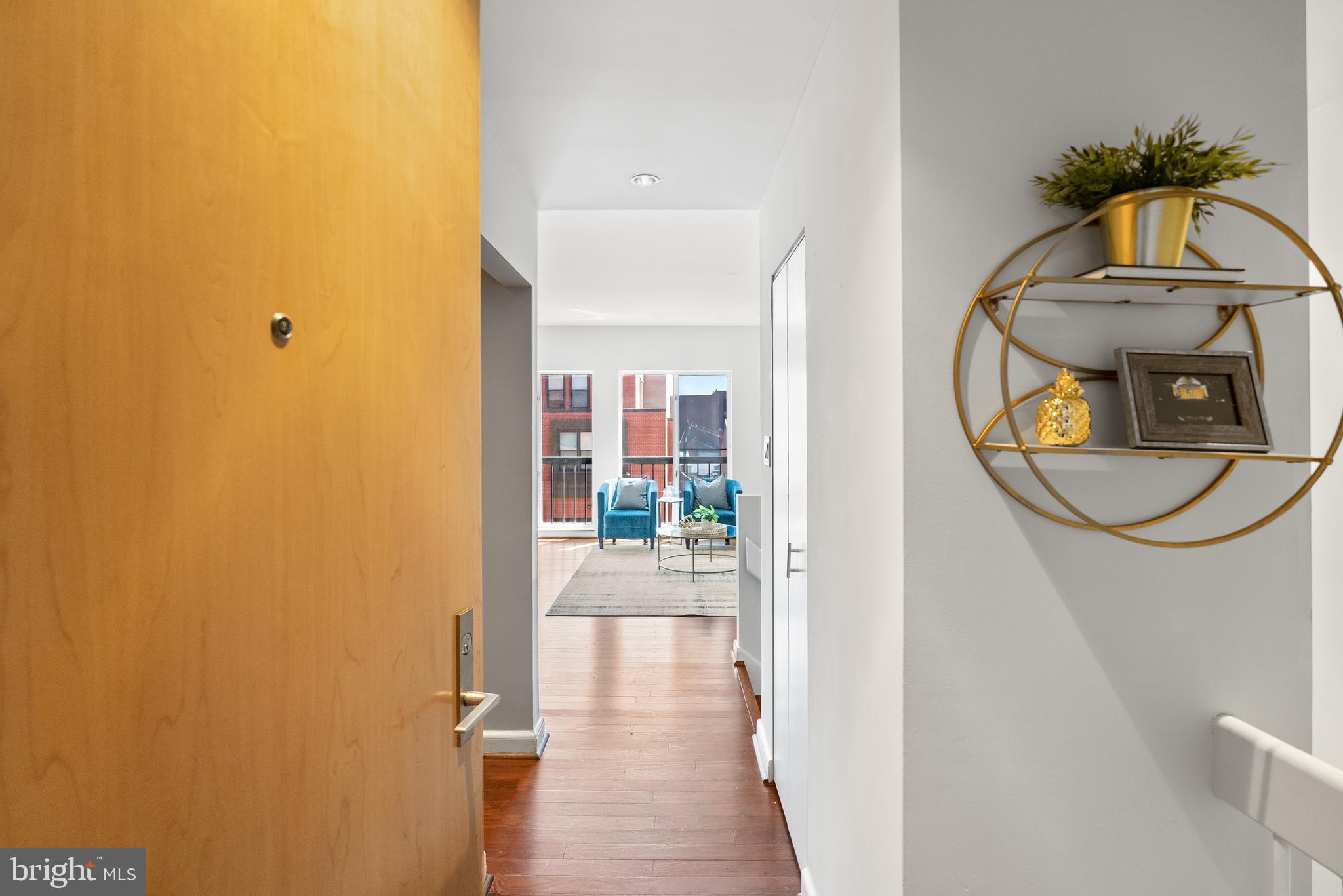 3251 Prospect Street Northwest, Unit 313 Washington, DC 20007 - Photo 16 of 43 a view of a entryway door with wooden floor