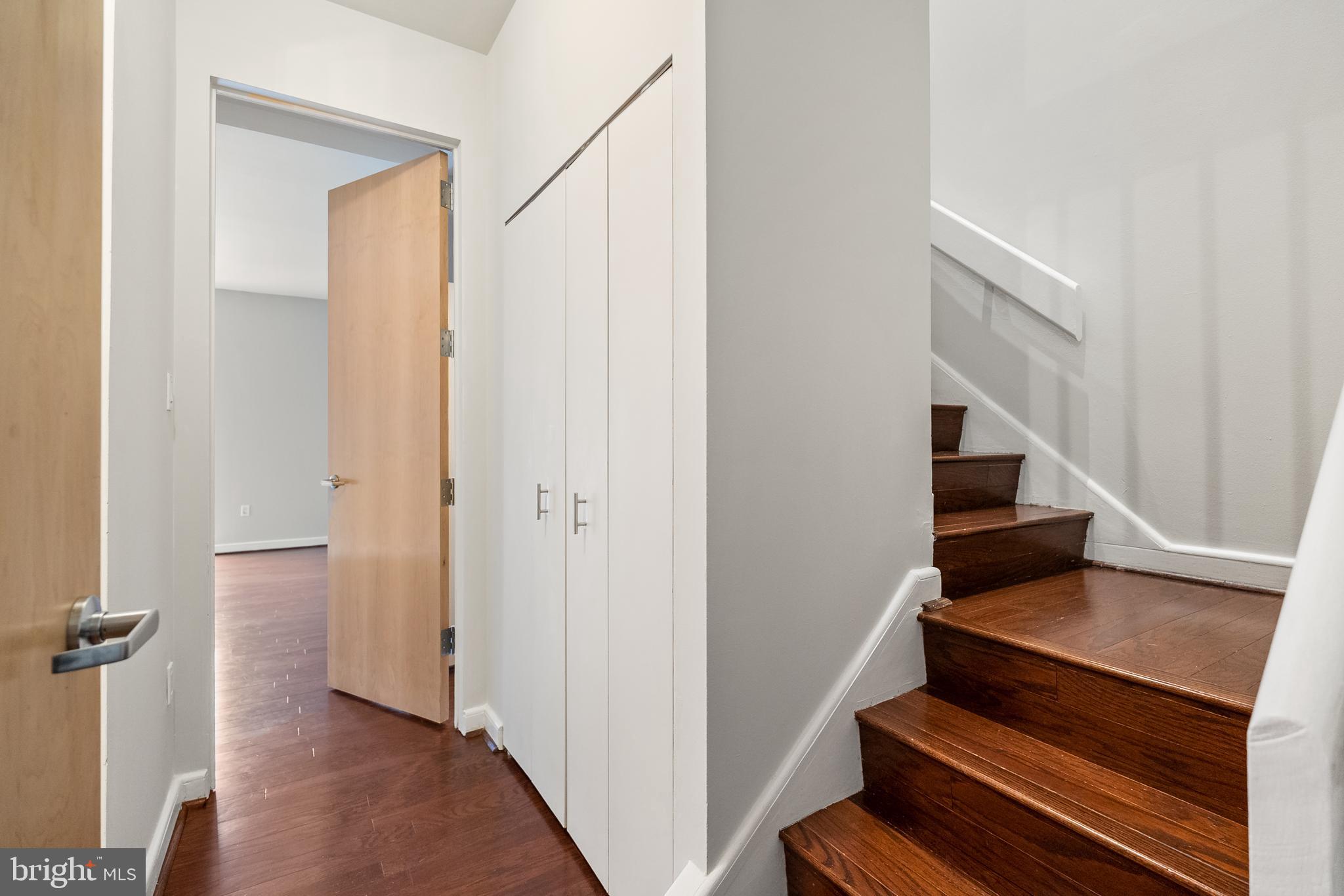 3251 Prospect Street Northwest, Unit 313 Washington, DC 20007 - Photo 17 of 43 Stairs to lower level bedroom/ bathroom