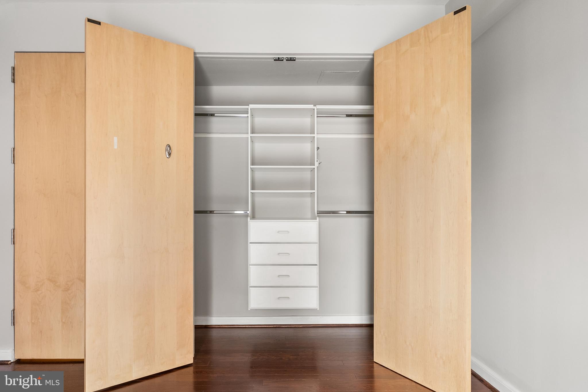 3251 Prospect Street Northwest, Unit 313 Washington, DC 20007 - Photo 23 of 43 a view of walk in closet with empty racks