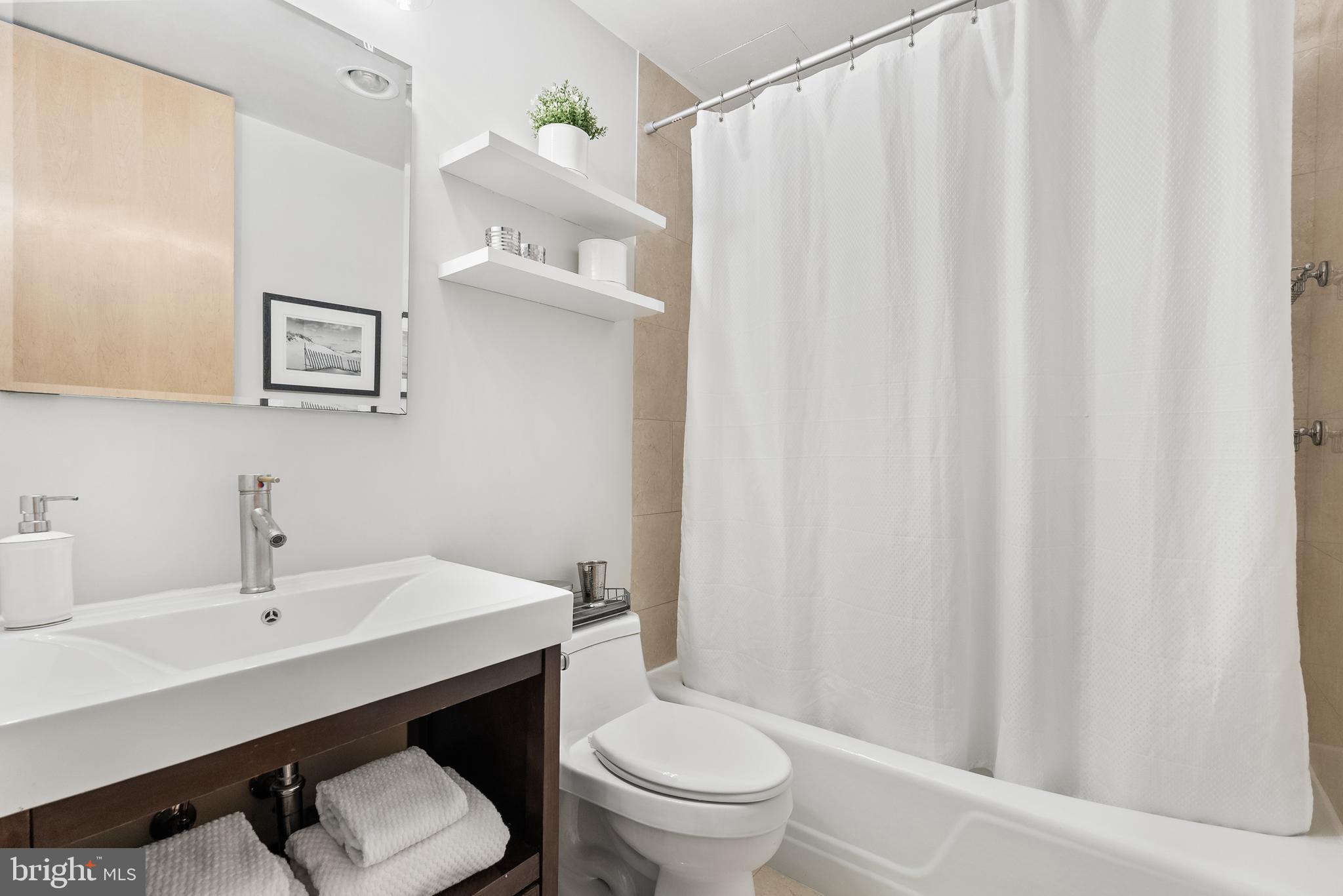 3251 Prospect Street Northwest, Unit 313 Washington, DC 20007 - Photo 25 of 43 Full bath with tub