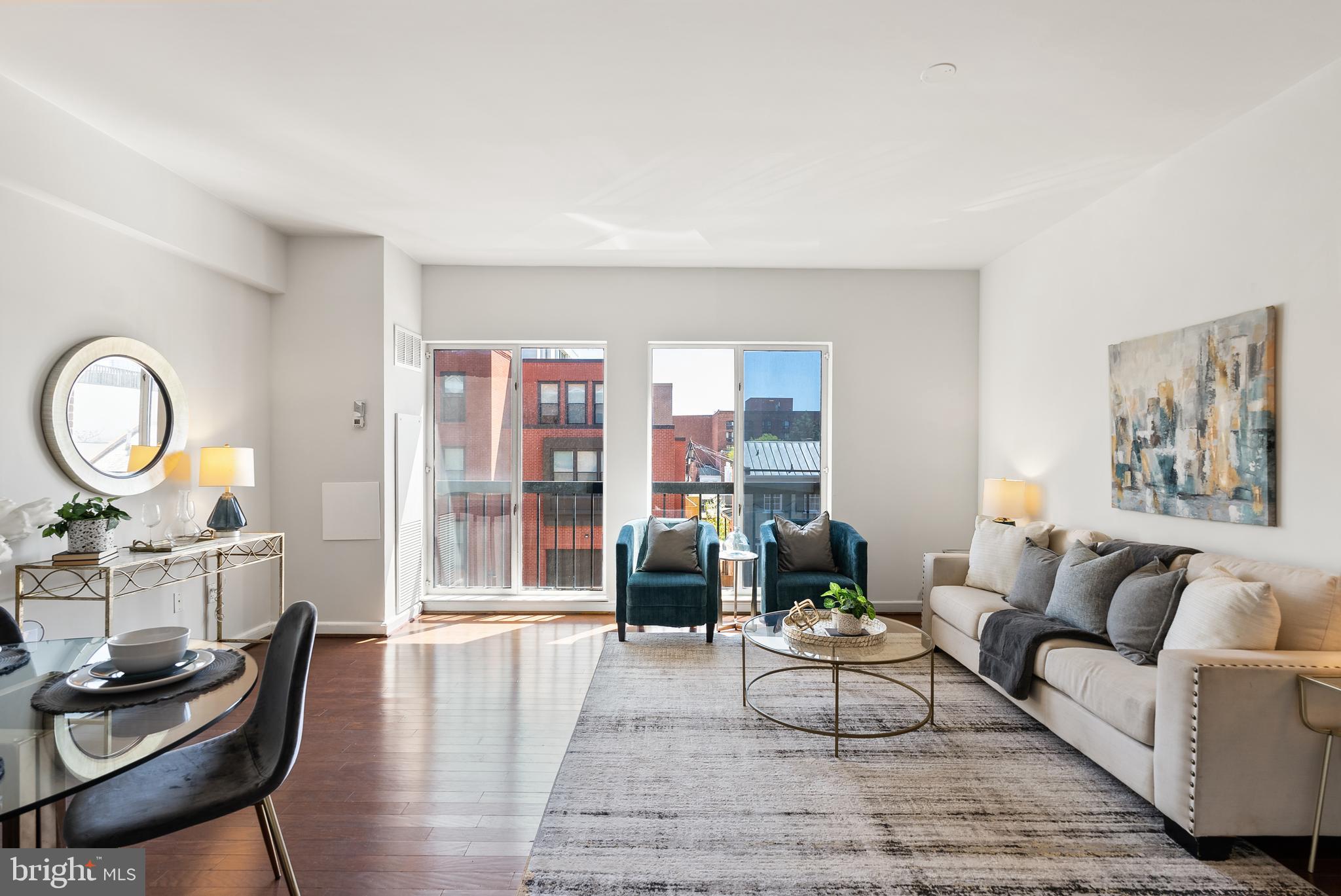 3251 Prospect Street Northwest, Unit 313 Washington, DC 20007 - Photo 4 of 43 a living room with furniture and wooden floor