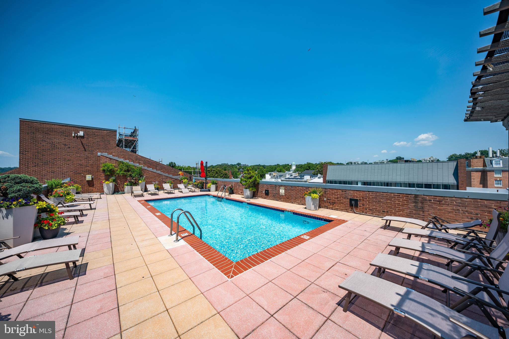 3251 Prospect Street Northwest, Unit 313 Washington, DC 20007 - Photo 42 of 43 a view of swimming pool with lounge chair