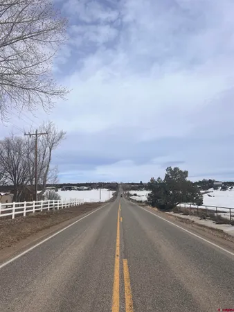 a view of a street next to a city