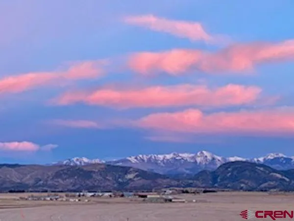 a view of sunset and city