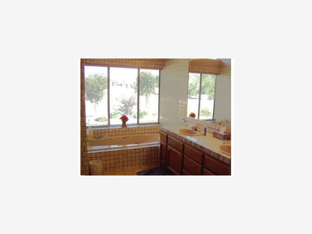 2415 Ric Drive Gilroy, CA 95020 - Photo 7 of 9 a outdoor space with sink large windows and a rug