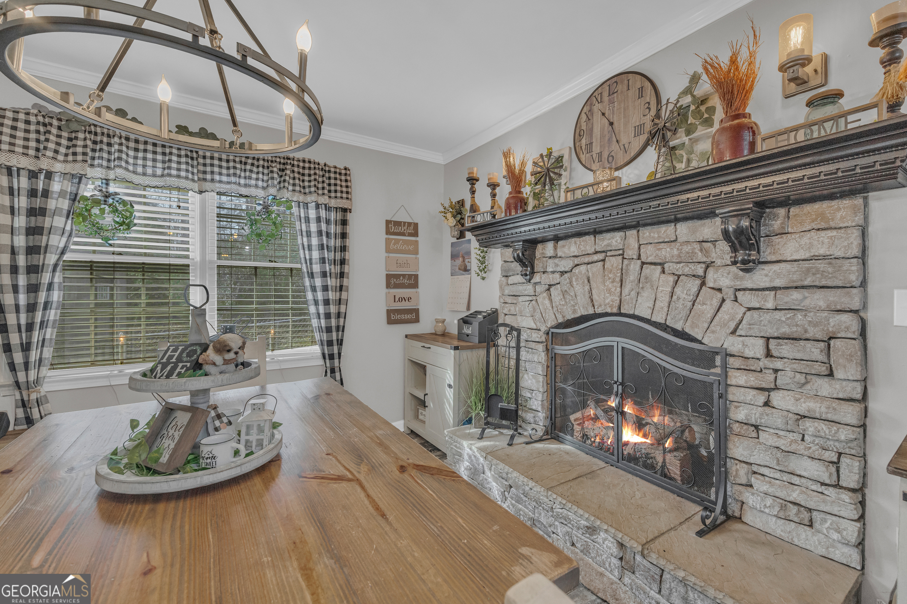 340 Riverbend Circle Royston, GA 30662 - Photo 51 of 108 a living room with furniture a fireplace and a table