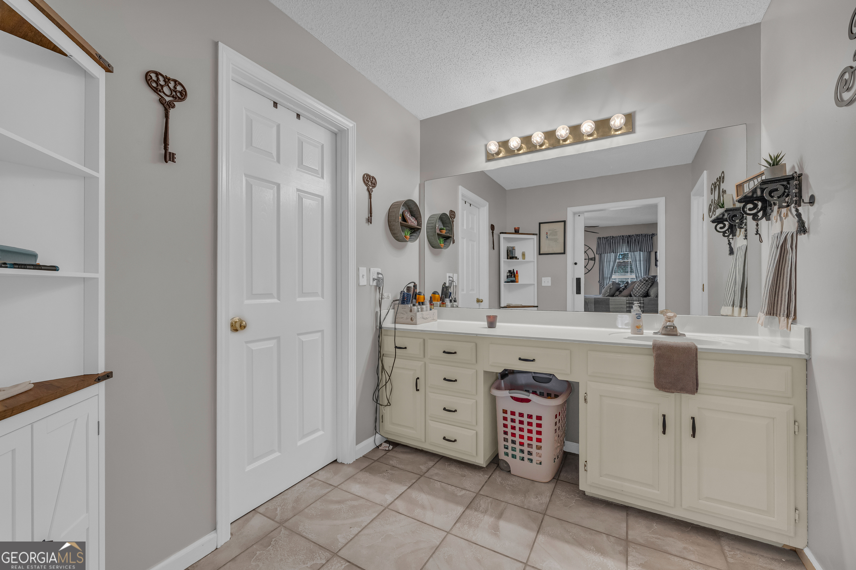 340 Riverbend Circle Royston, GA 30662 - Photo 56 of 108 a spacious bathroom with a sink a mirror and a shower