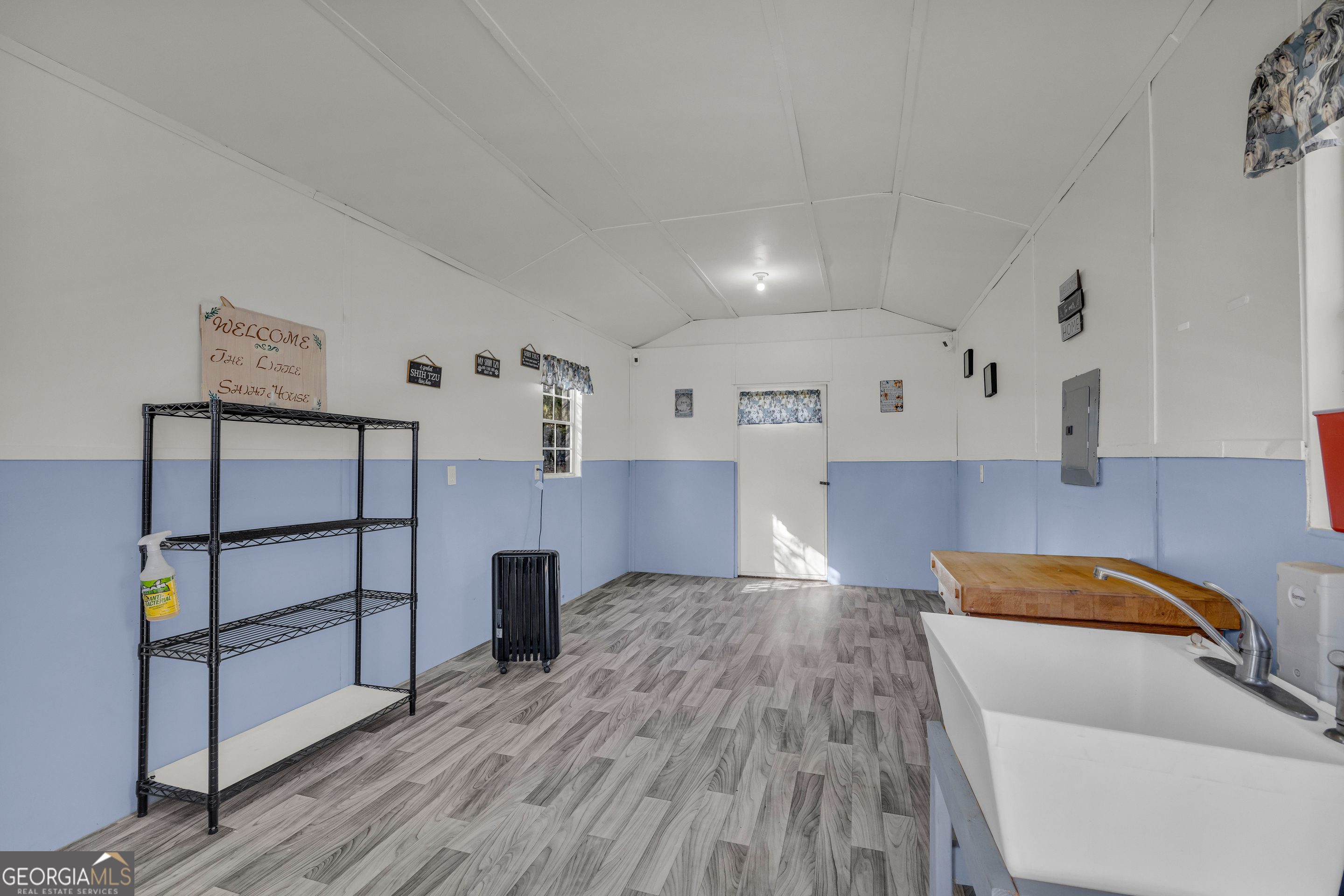 340 Riverbend Circle Royston, GA 30662 - Photo 80 of 108 a living room with furniture and a wooden floor