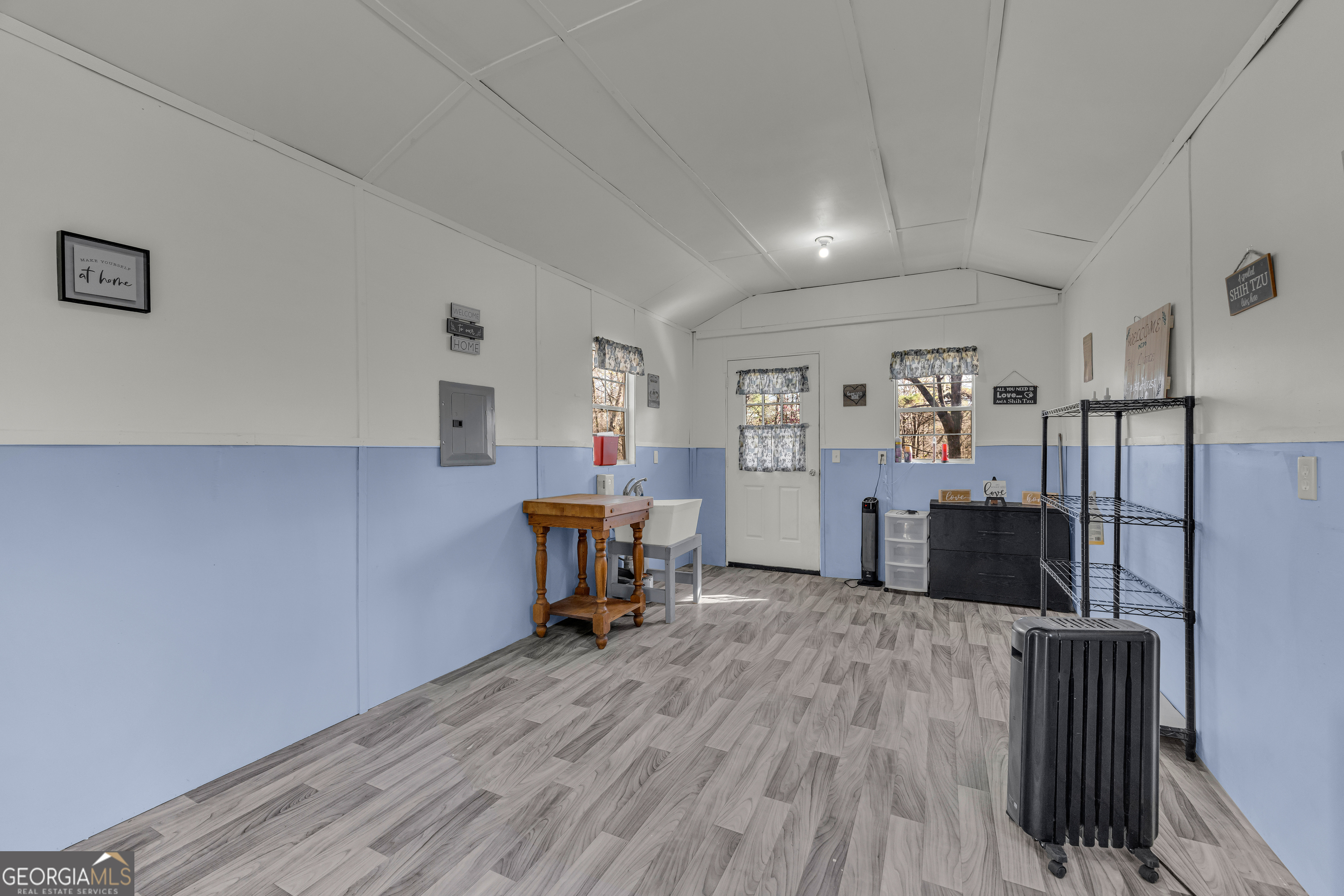 340 Riverbend Circle Royston, GA 30662 - Photo 81 of 108 a view of a workspace with furniture and wooden floor