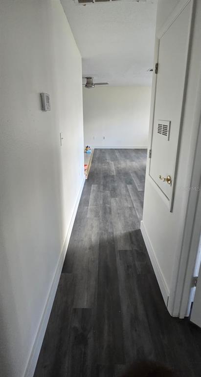 526 Reading Street Northwest Port Charlotte, FL 33952 - Photo 6 of 12 wooden floor in a gallery