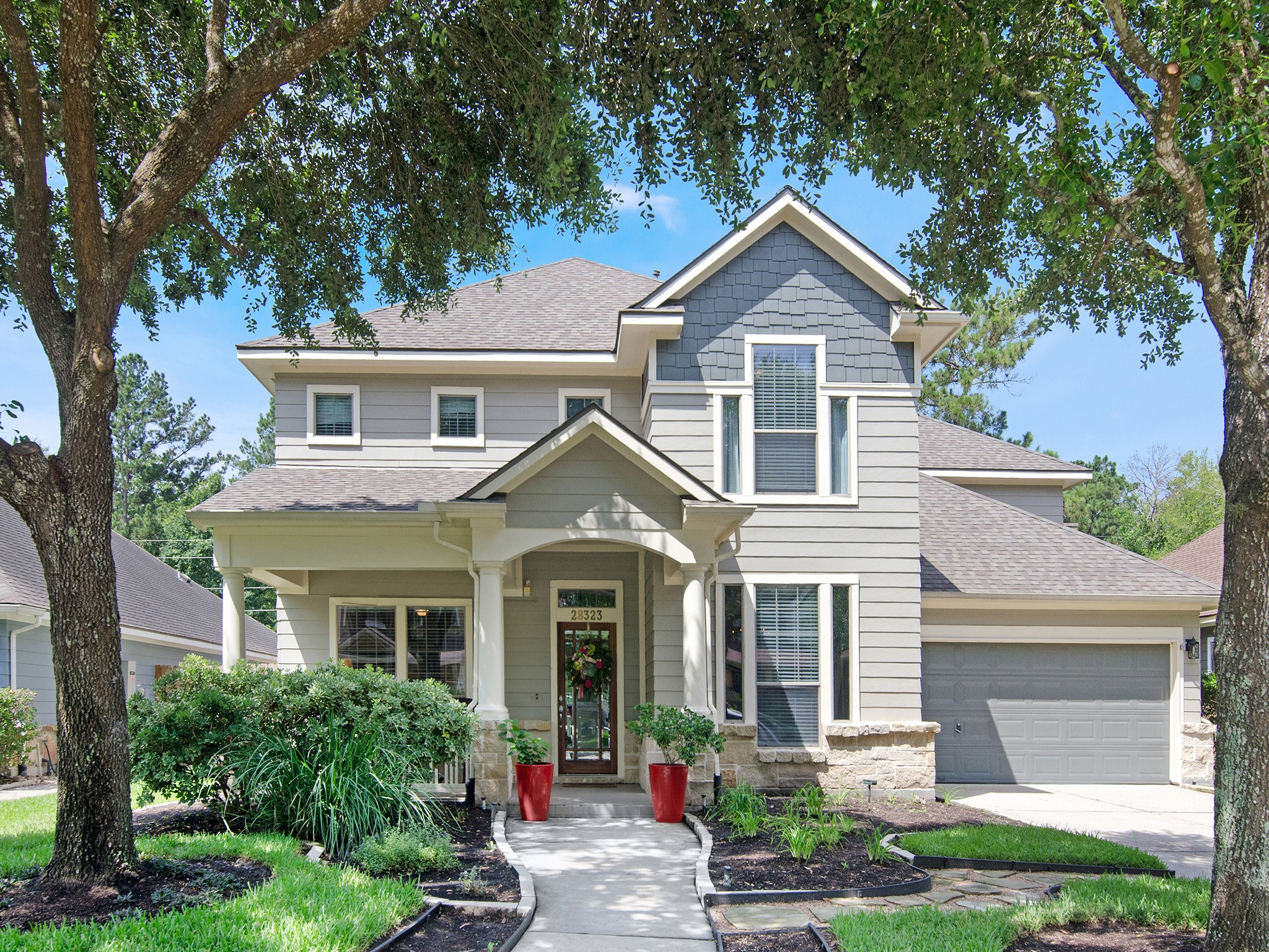 28323 Ryans Ridge Lane Spring, TX 77386 - Photo 1 of 45 This beautiful, well maintained family home welcomes you with exceptional curb appeal, highlighted by a charming covered front porch, attractive stone accents, mature landscaping and recent exterior improvements including, paint and new roof. The oversized two-car garage provides generous space for storage, hobbies and everyday convenience.