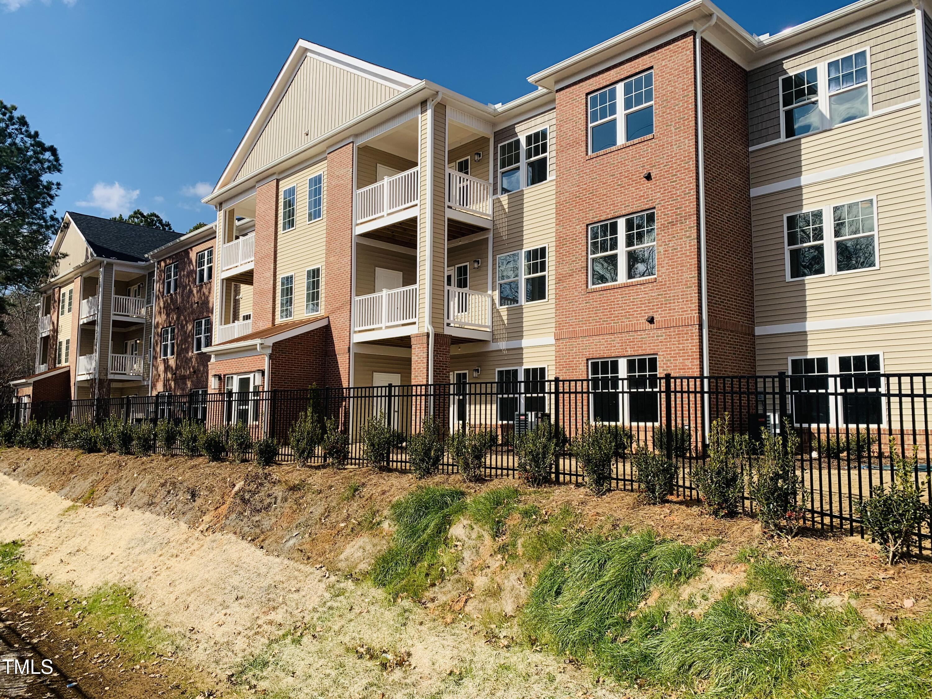 403 Weather Ridge Lane, Unit 42 Cary, NC 27513 - Photo 2 of 17 {WCC 400 Rear Elevation photo 1.24.25