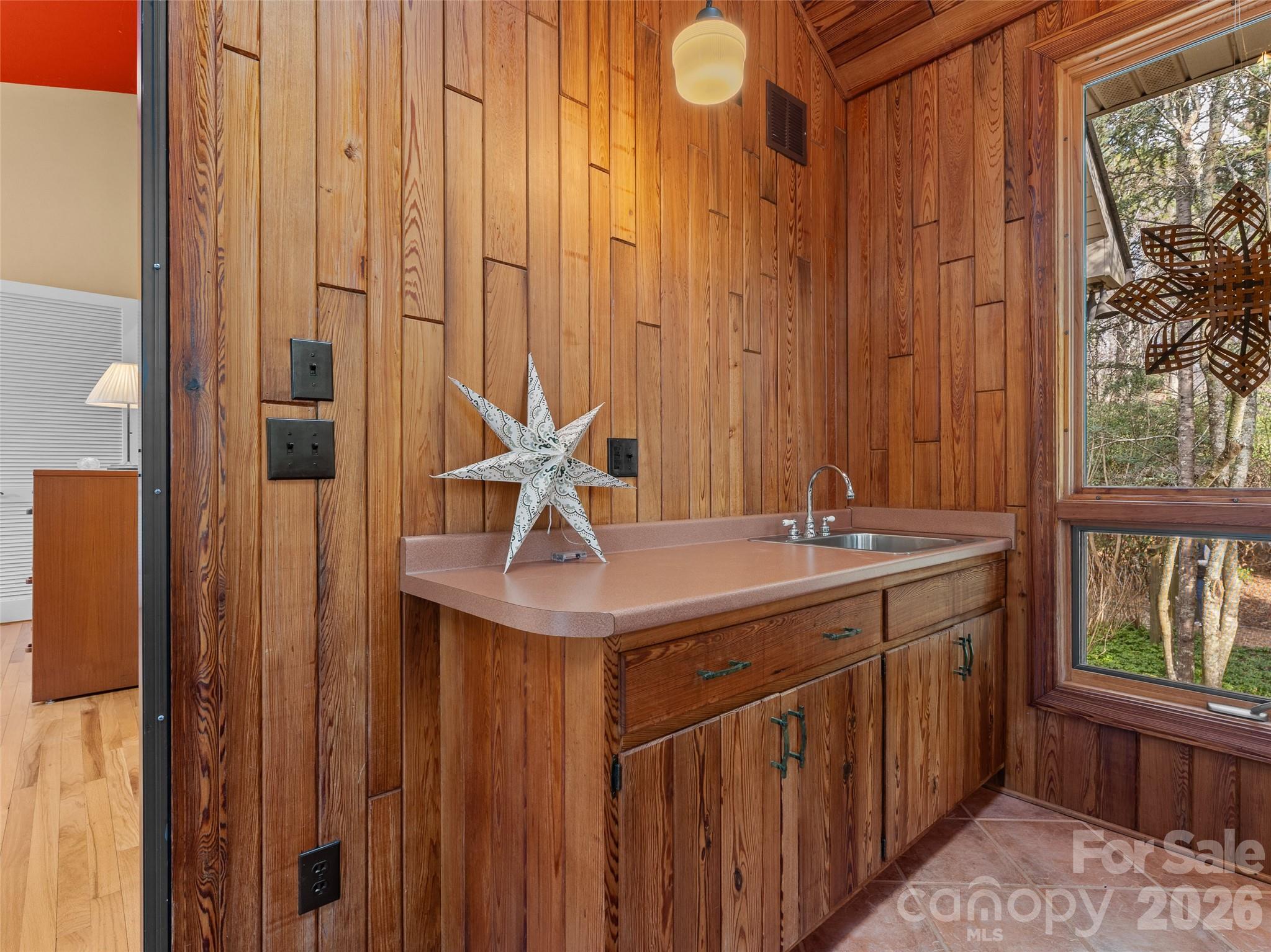 203 Heathcote Road Hendersonville, NC 28791 - Photo 26 of 47 a bathroom with a granite countertop sink and a mirror