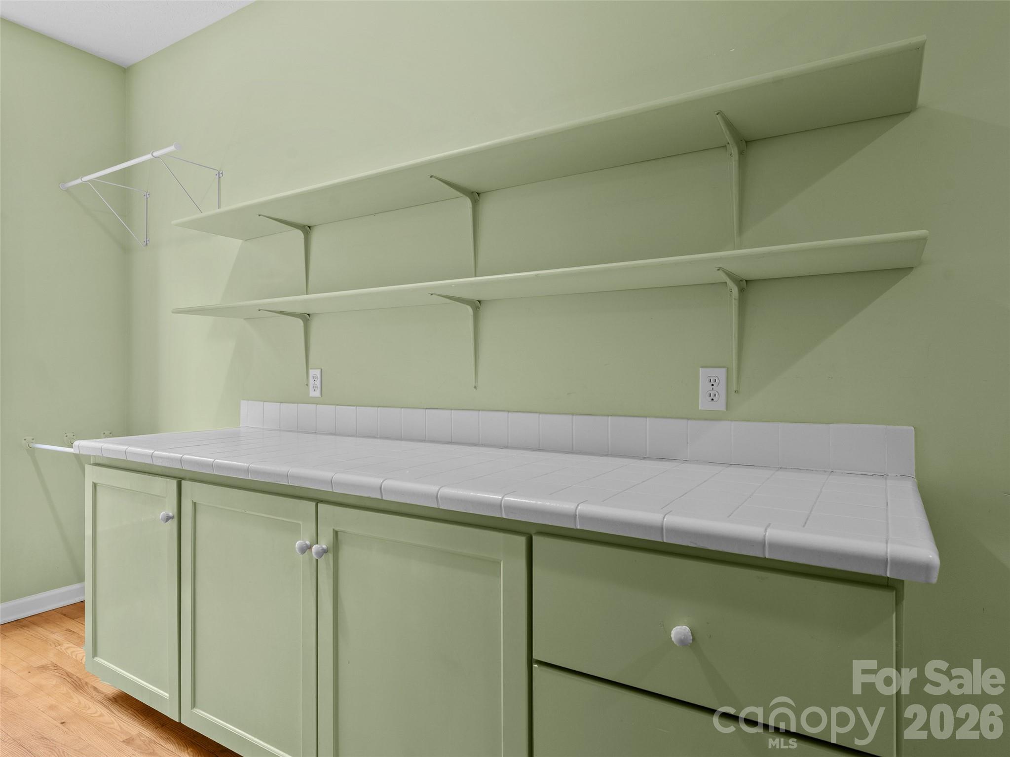 203 Heathcote Road Hendersonville, NC 28791 - Photo 34 of 47 a room with cabinets