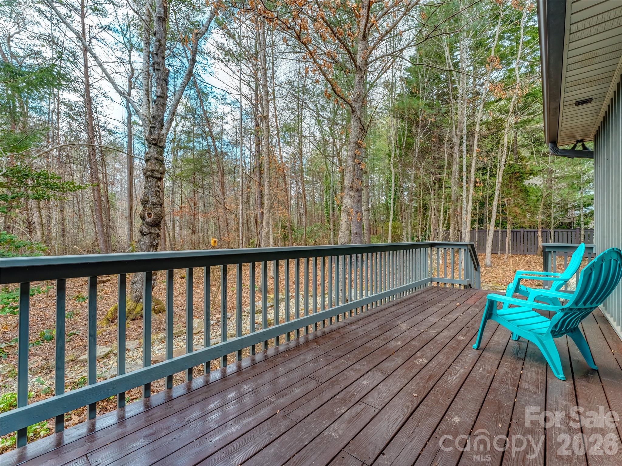 203 Heathcote Road Hendersonville, NC 28791 - Photo 44 of 47 a balcony with wooden floor and outdoor space