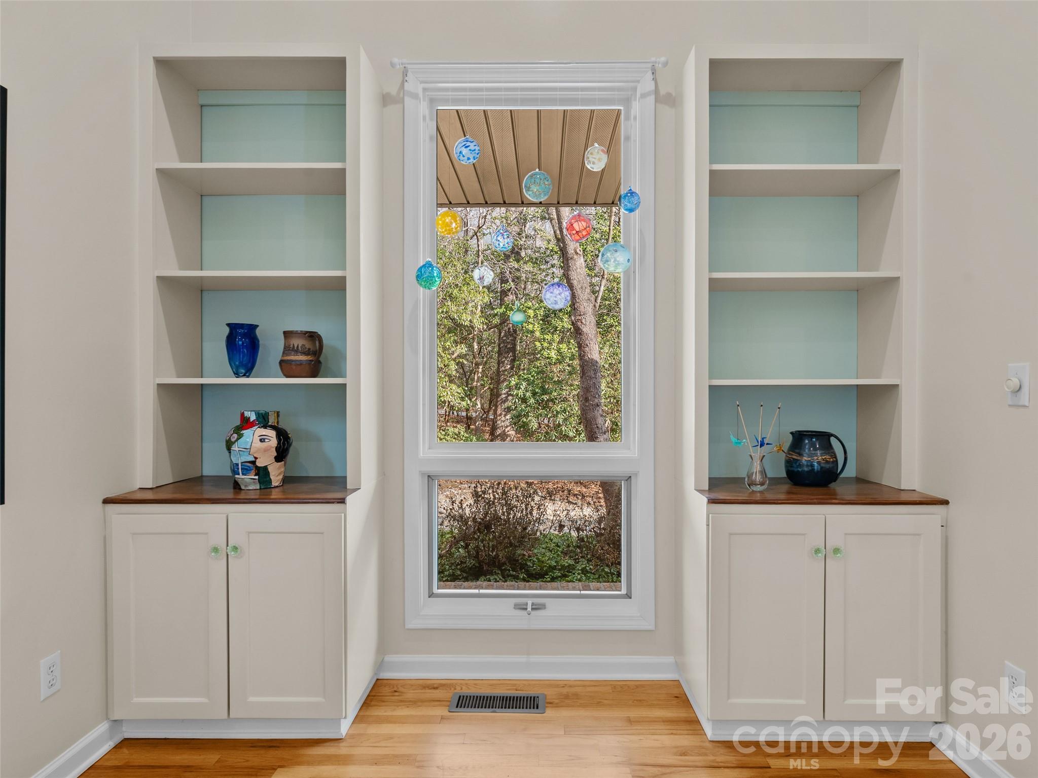 203 Heathcote Road Hendersonville, NC 28791 - Photo 7 of 47 a view of walk in closet with clothes and shoes