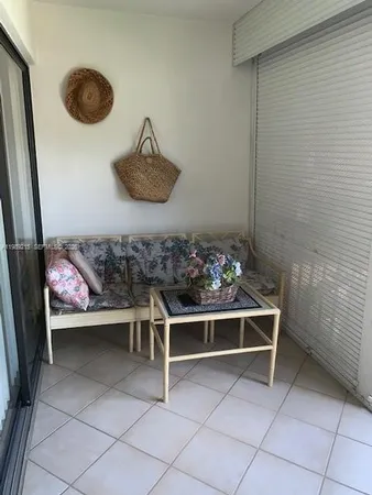 a view of a livingroom with furniture
