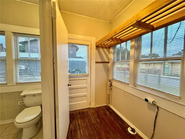 a bathroom with a toilet and a sink