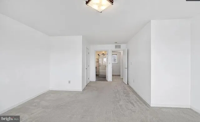 an empty room with a window