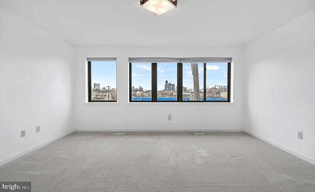 928 Wallace Street Philadelphia, PA 19123 - Photo 14 of 19 an empty room with a window