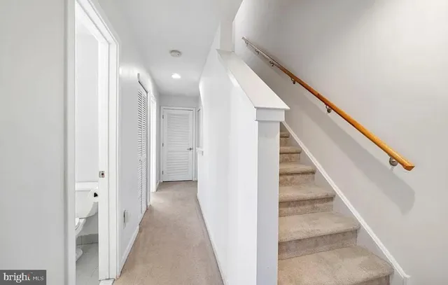 a bathroom with a sink a mirror and a shower