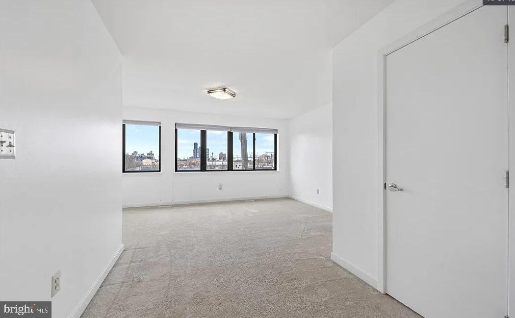 928 Wallace Street Philadelphia, PA 19123 - Photo 19 of 19 a view of an empty room with a window