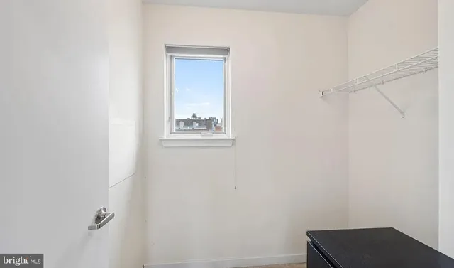 a view of small space with closet