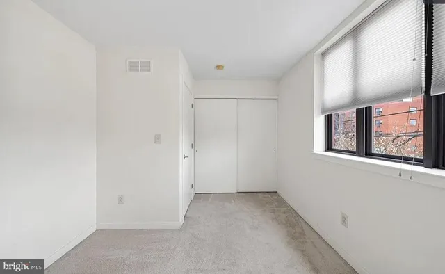 a view of an empty room with window