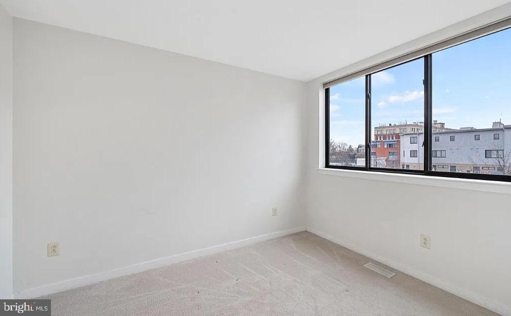 928 Wallace Street Philadelphia, PA 19123 - Photo 9 of 19 an empty room with a window