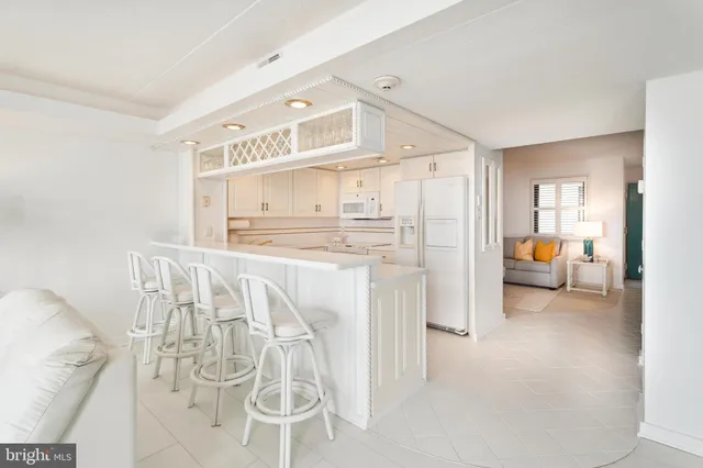 a view of a livingroom with furniture window and outside view
