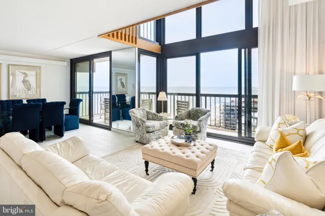 a view of a balcony with an ocean view