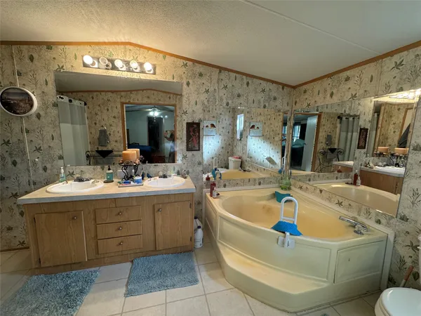 a view of a hallway with washer and dryer
