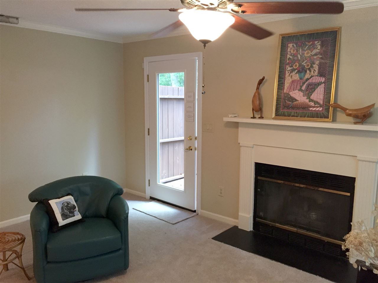 134 Timber Ridge Drive Durham, NC 27713 - Photo 11 of 25 New carpet installed prior to listing. Gas log fireplace is Living Room's focal point and the bumped out window allows sunlight from the lovely woods of Woodcroft. Replacement door leads to oversized deck. Lighted ceiling fans can operate remote control. Living Room
