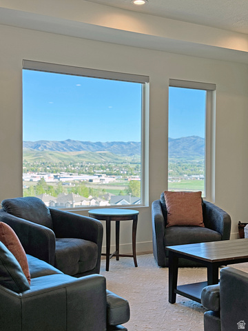 851 Grandview Drive Morgan, UT 84050 - Photo 16 of 68 Expansive windows framing a distant mountain range and cityscape