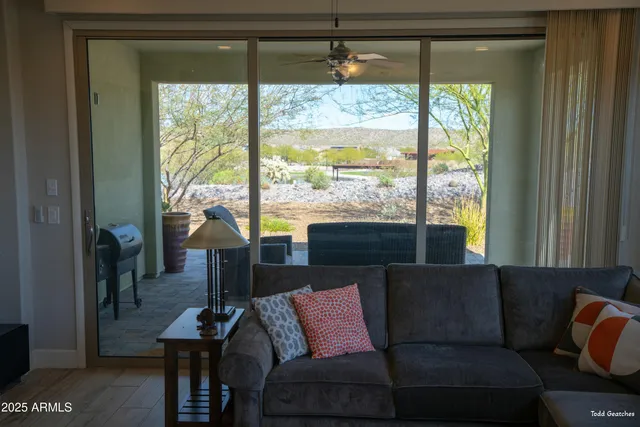 a view of a dining room with furniture window and outside view