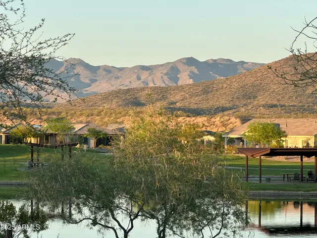 a view of a terrace with a table and chairs
