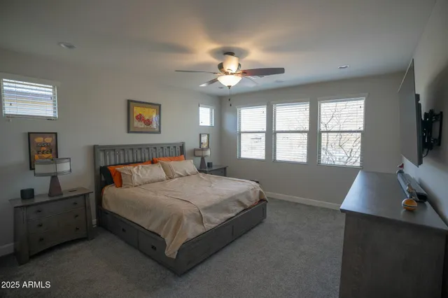 a en suite bathroom with a sink and a mirror