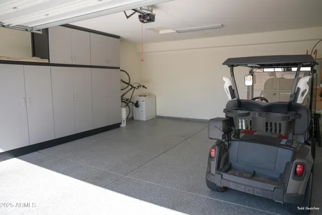 a view of a patio with dining table and chairs