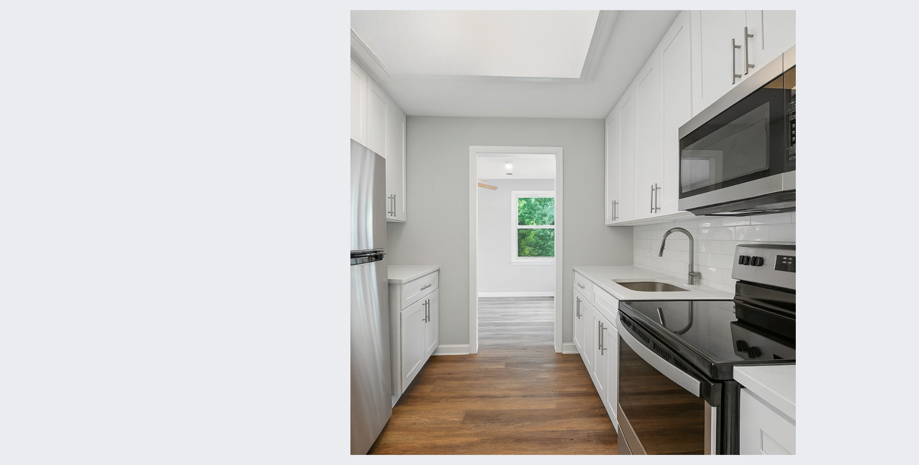 101 Bar Harbour Road, Unit 6D Schaumburg, IL 60193 - Photo 7 of 14 a kitchen with stainless steel appliances a stove microwave and sink