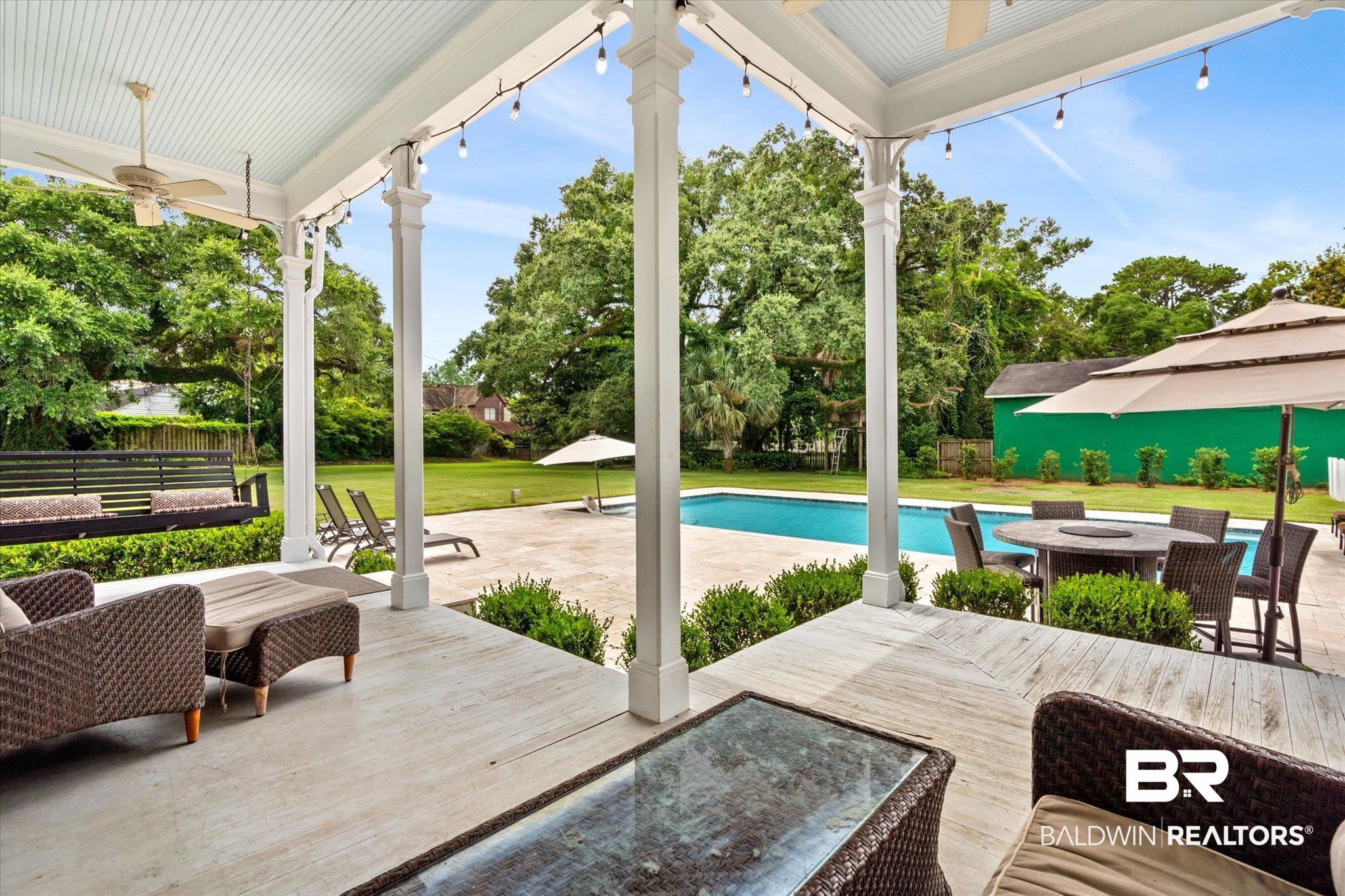 2205 Spring Hill Avenue Mobile, AL 36607 - Photo 35 of 59 View of swimming pool with a patio, a lawn, and ceiling fan