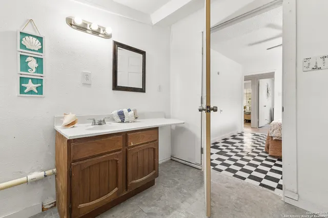 a view of a workspace with furniture