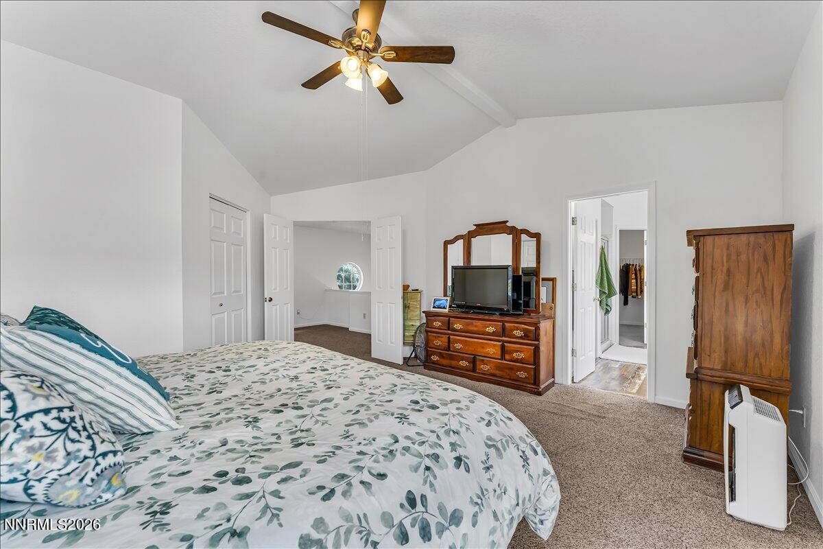 10 Eagle Claw Court Reno, NV 89523 - Photo 22 of 36 a bedroom with a bed and a flat screen tv