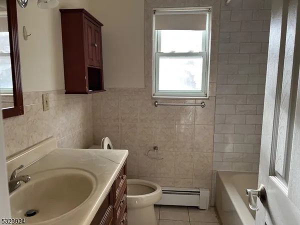 a bathroom with a sink and a tub