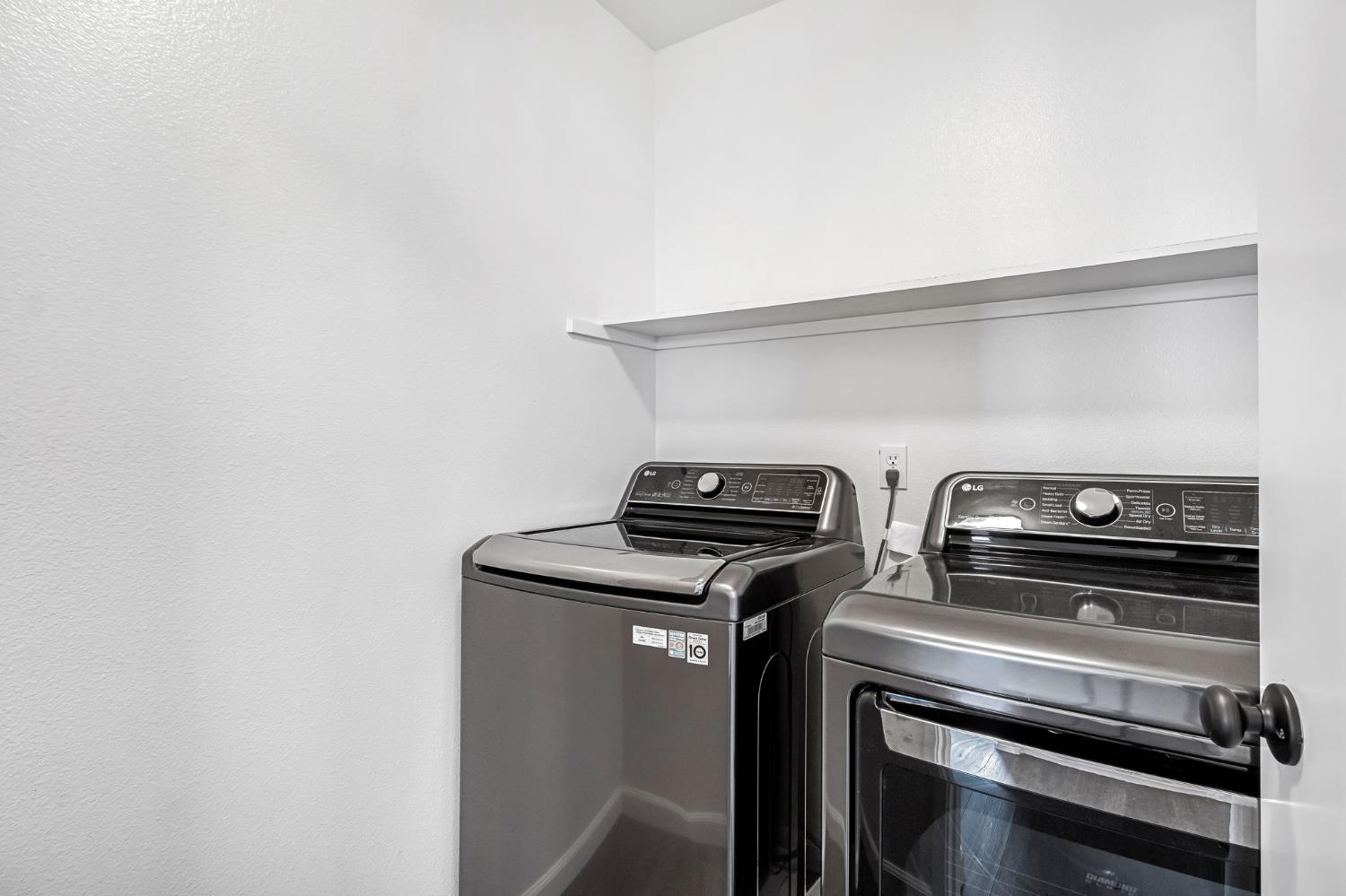 265 West Decatur Avenue Clovis, CA 93611 - Photo 13 of 19 a stove top oven sitting inside of a kitchen