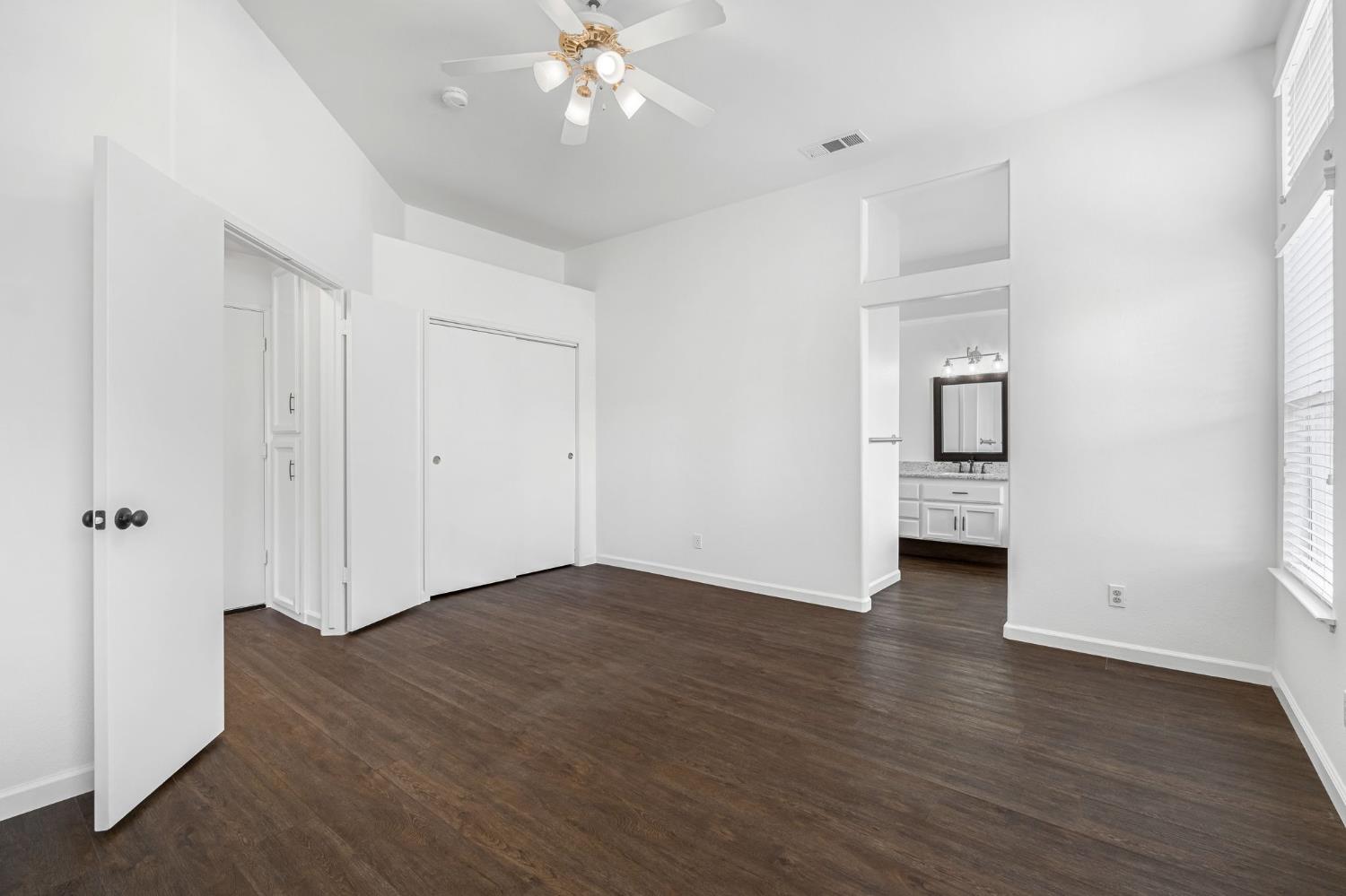 265 West Decatur Avenue Clovis, CA 93611 - Photo 14 of 19 a view of an empty room with wooden floor
