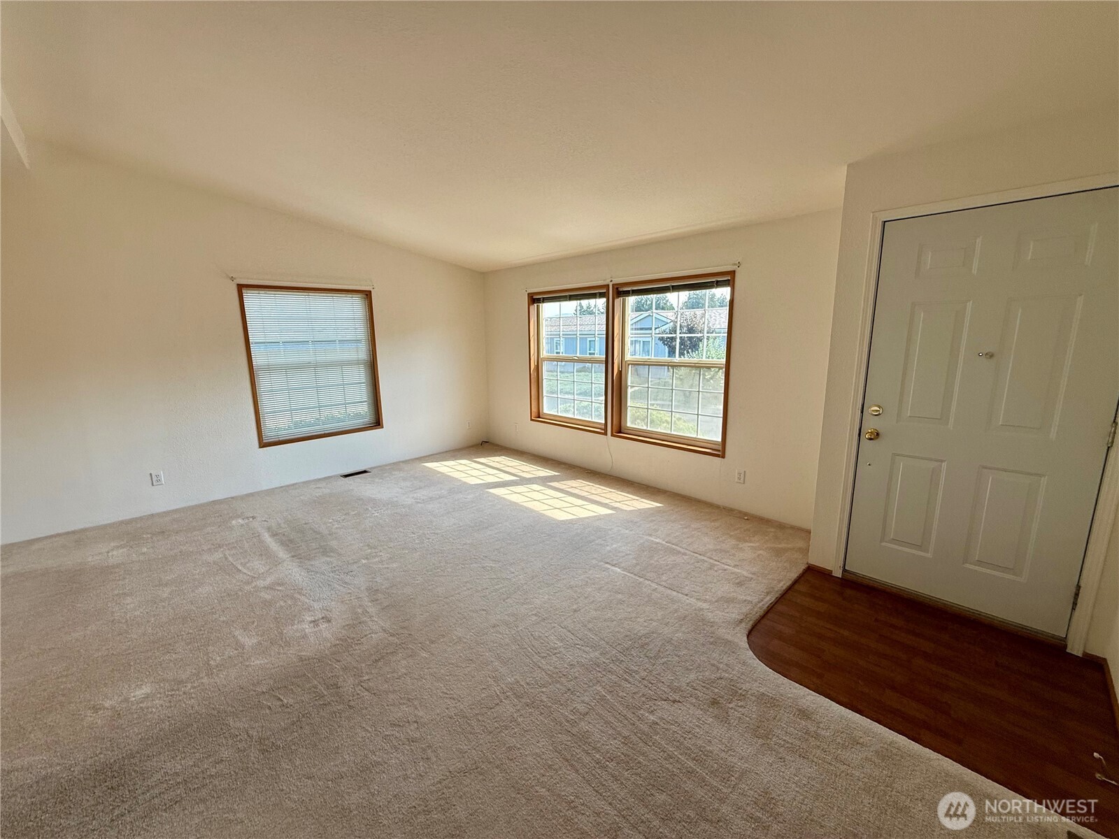 1628 Pleasant Avenue Wenatchee, WA 98801 - Photo 4 of 24 a view of livingroom with hardwood floor and window
