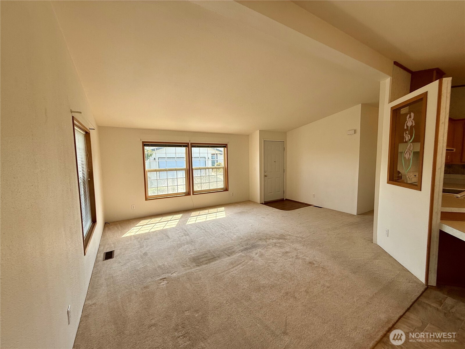 1628 Pleasant Avenue Wenatchee, WA 98801 - Photo 5 of 24 a view of an empty room with a window
