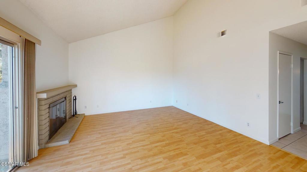 157 Conifer Circle Oak Park, CA 91377 - Photo 3 of 21 a view of empty room with wooden floor
