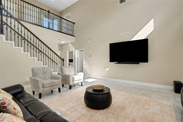 a kitchen with stainless steel appliances kitchen island granite countertop a sink and cabinets