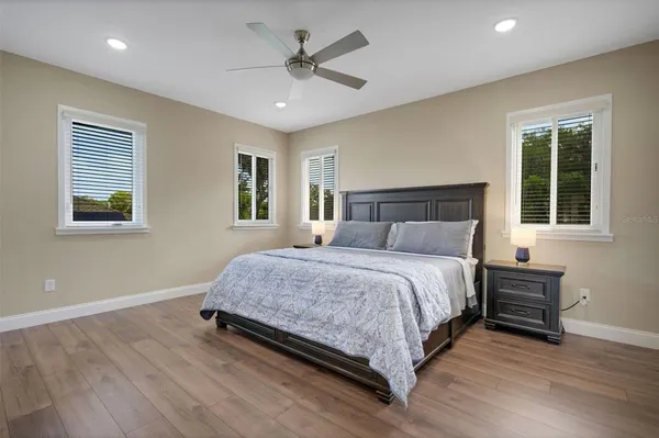 a utility room with cabinets washer and dryer